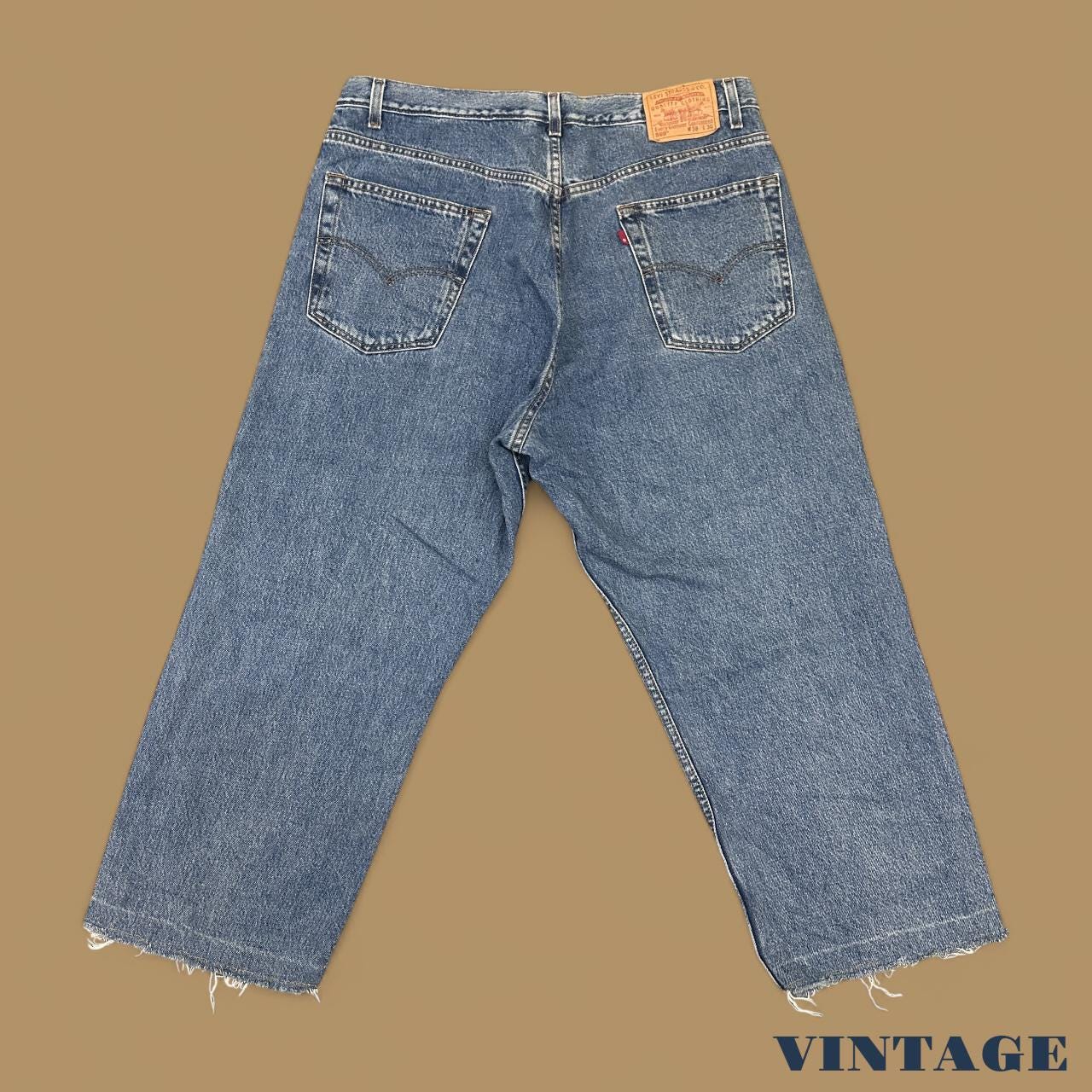Vintage Levi's 569 Relaxed Straight Leg Raw Hem Cropped Jeans Mid Blue W38 L26