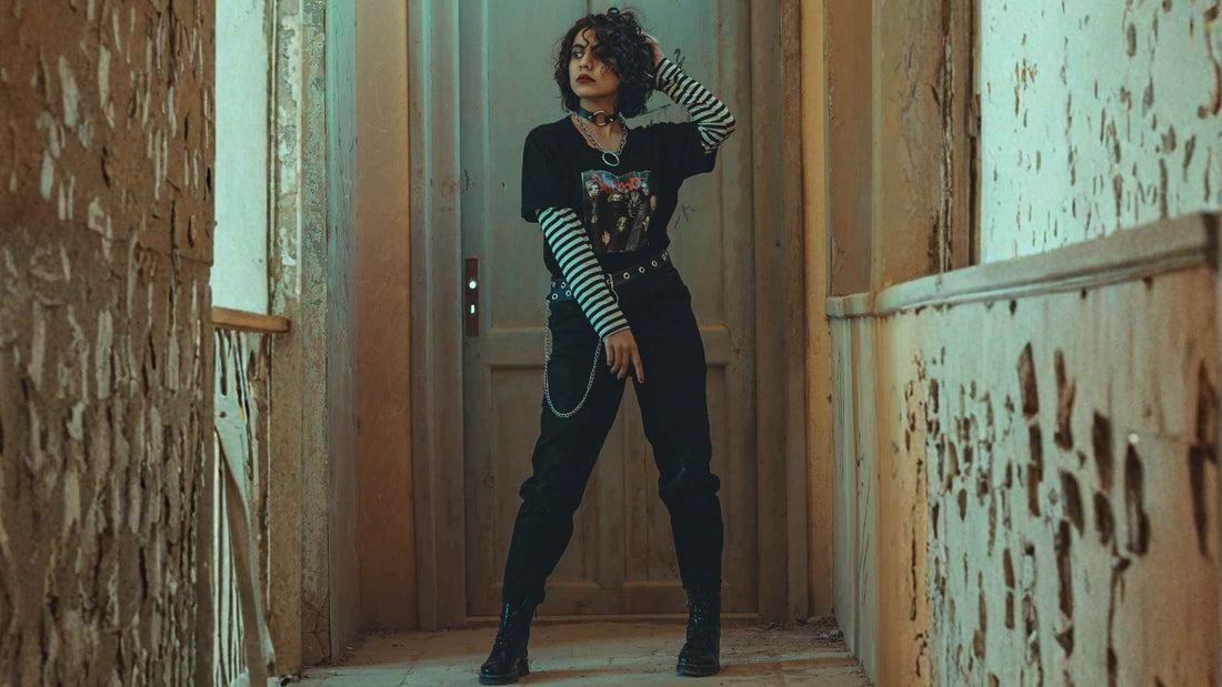 Gothic outfit featuring black denim, chains and a vintage band tee