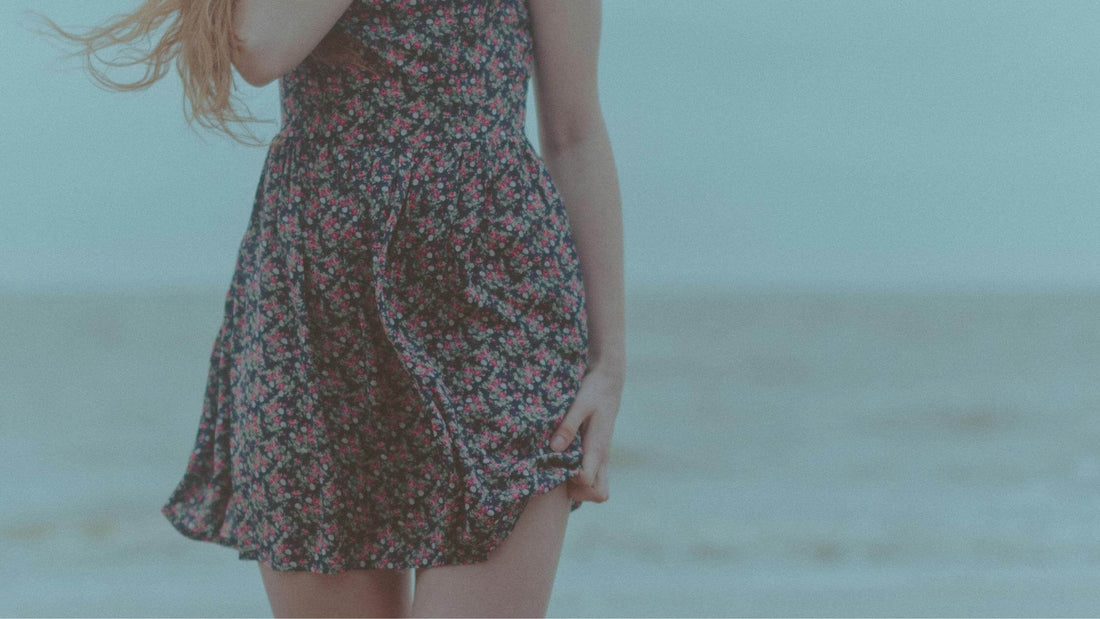 Woman wearing a fitted dress - The Brag Vintage Dress Fitting Guide