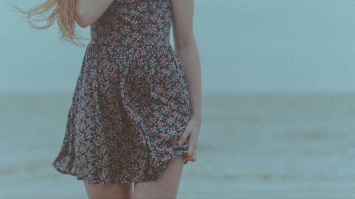 Woman wearing a fitted dress - The Brag Vintage Dress Fitting Guide