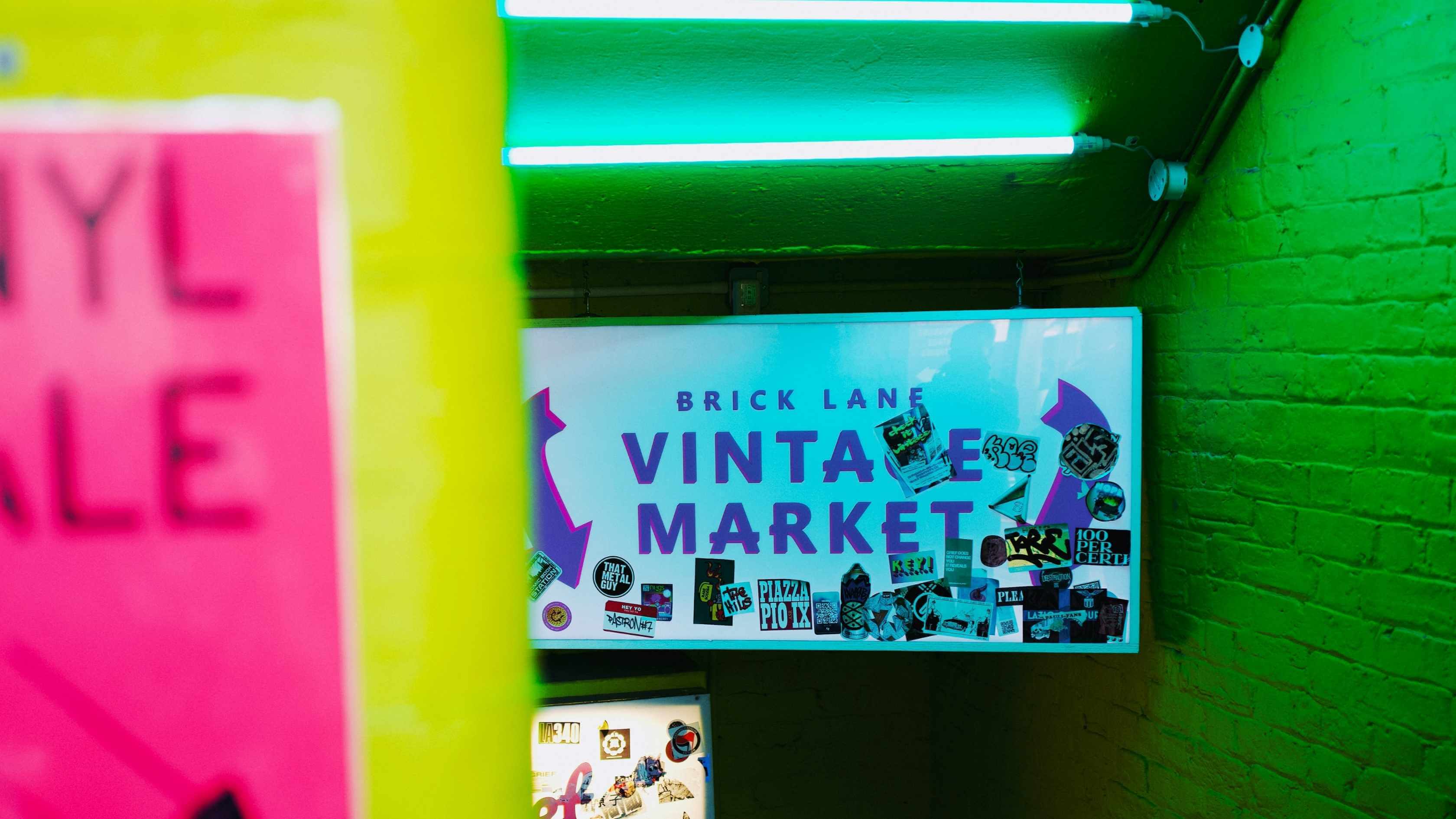Brick Lane Vintage Market in London features vintage clothing stalls and independent sellers