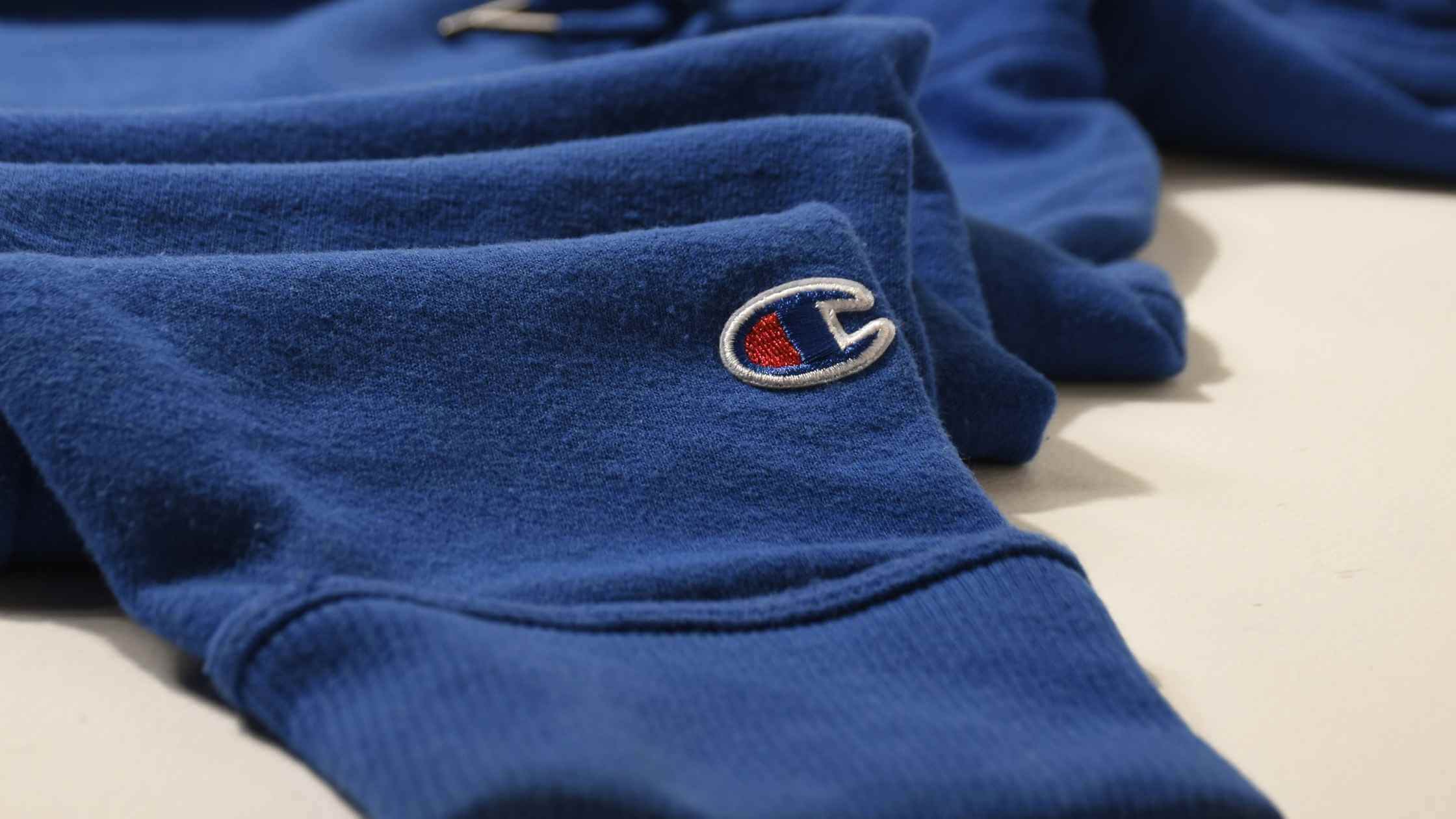 The History of Champion Sportswear Brand featuring a Champion Sweatshirt at Brag Vintage - Vintage Clothing Online