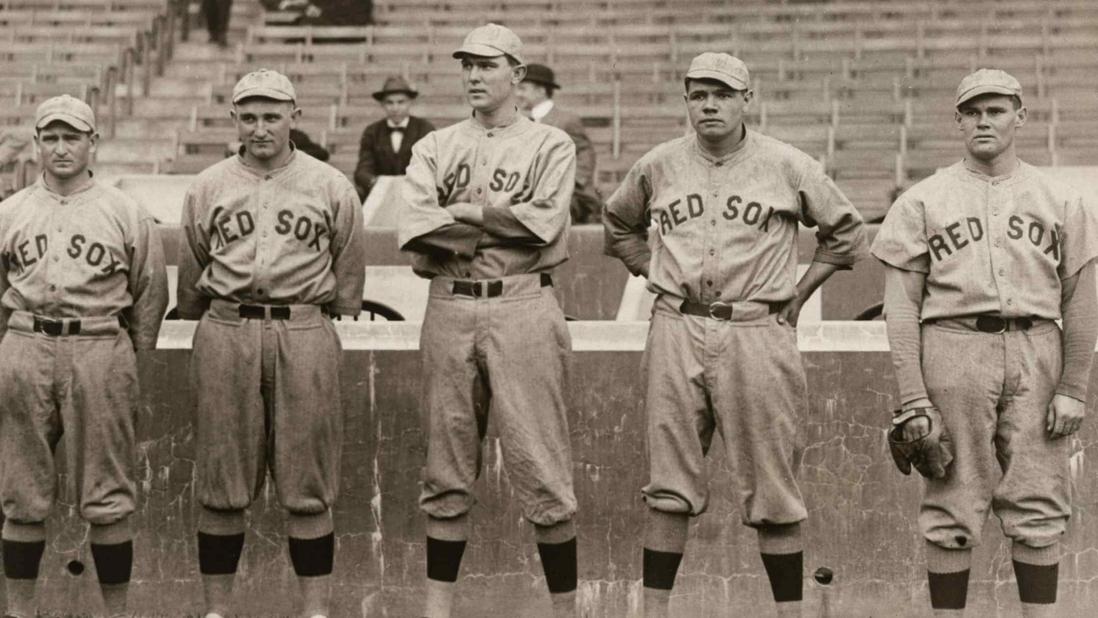 Historic Boston Red Sox team wearing classic baseball caps
