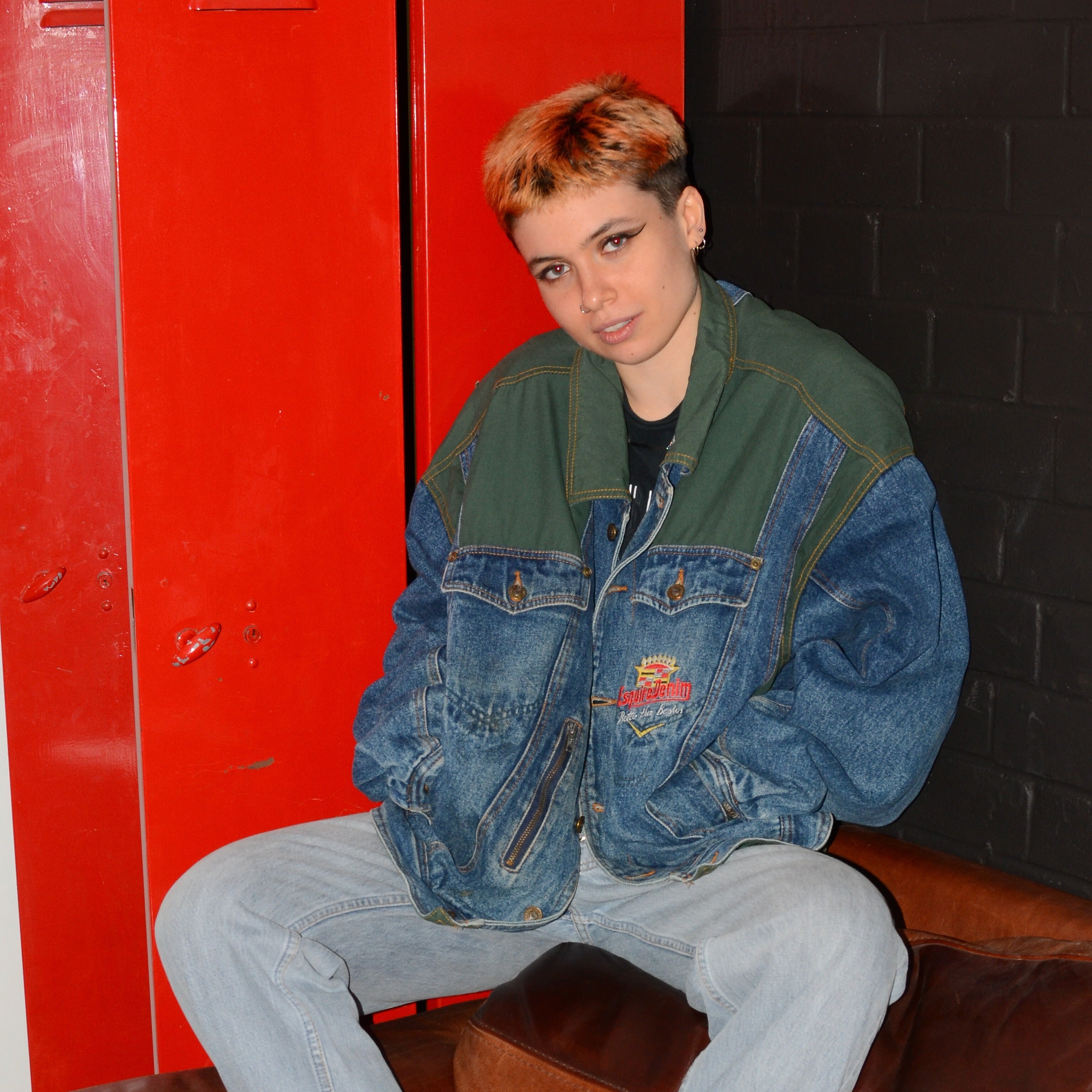 Vintage coats & jackets featuring a short haired model wearing a blue and green oversized denim jacket