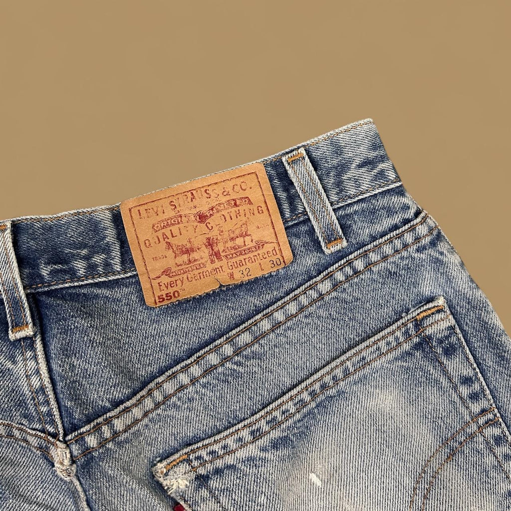 Vintage Levi&#39;s 550 Distressed Relaxed Straight Leg Jeans Mid Blue W32 L30