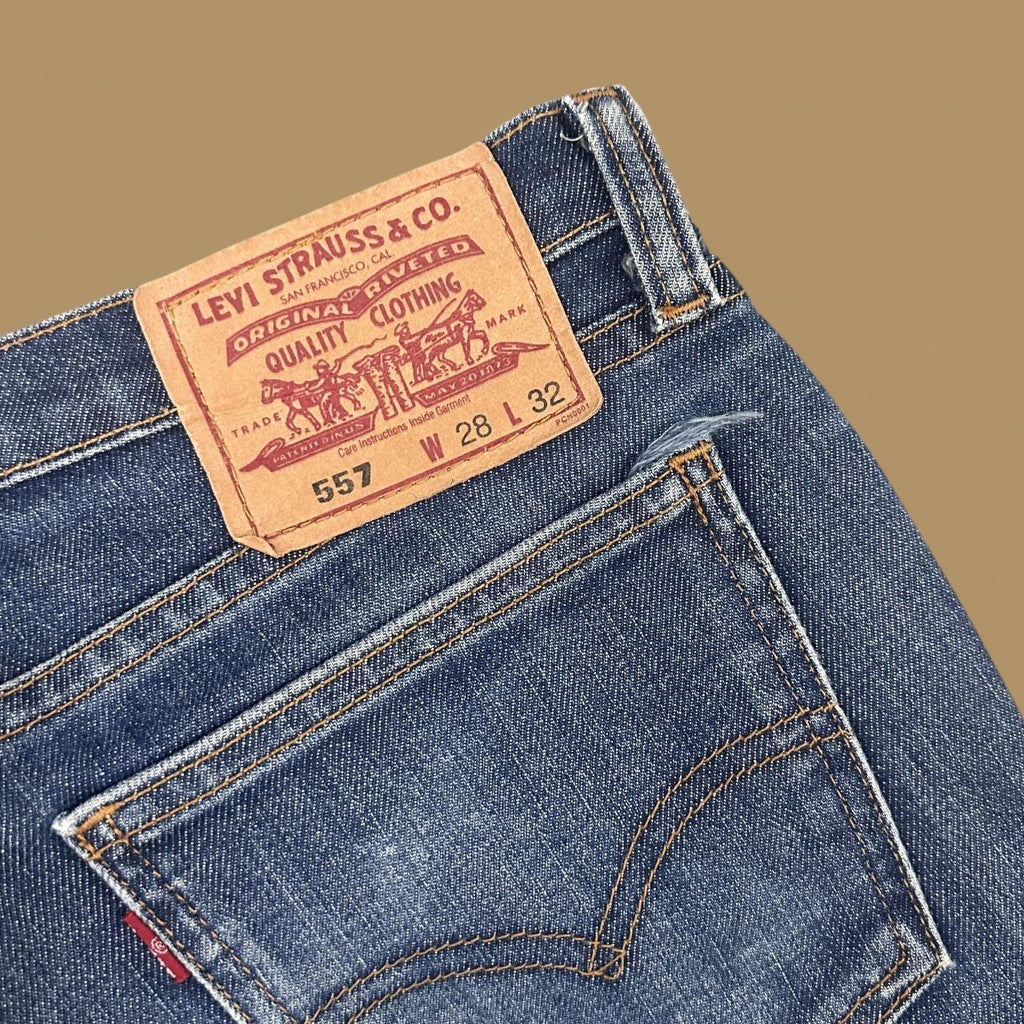 Vintage Y2k Levi&#39;s 557 Raw Hem Bootcut Jeans Dark Blue W30 L29