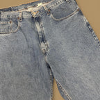 Vintage Levi&#39;s 569 Relaxed Straight Leg Raw Hem Cropped Jeans Mid Blue W38 L26