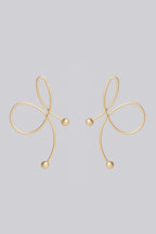 Zina Swirl Statement Gold Earrings
